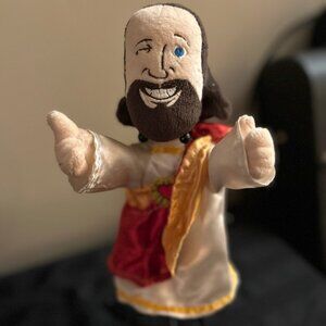 "Buddy Christ" plush from the movie Dogma